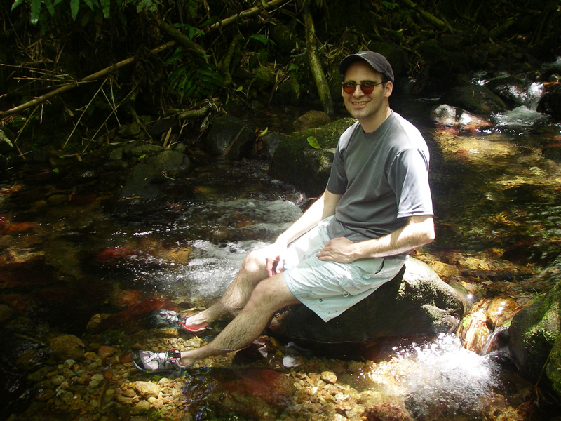 Eric soaking his feet after the hike
