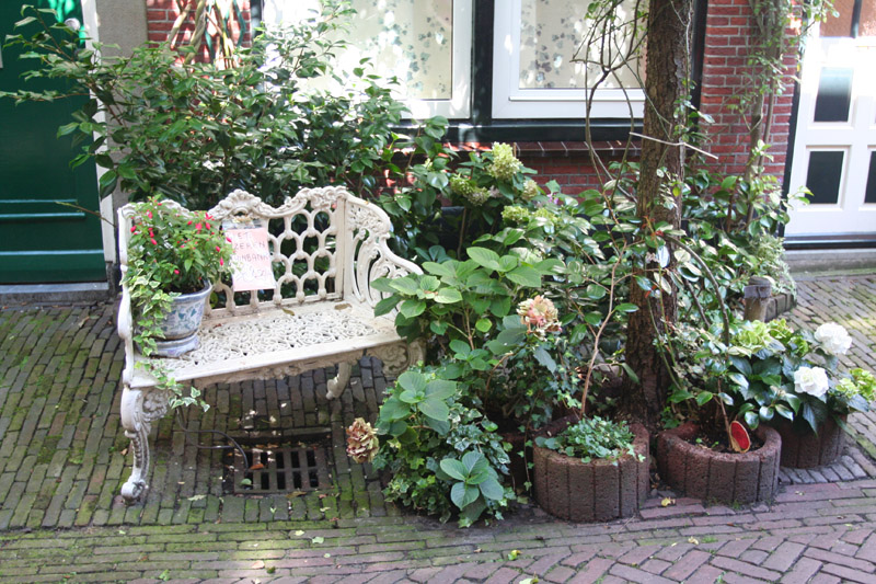 sitting area in residential alleyway