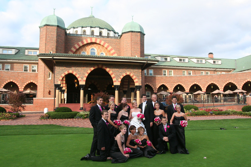 posing in from of the Medinah CC clubhouse
