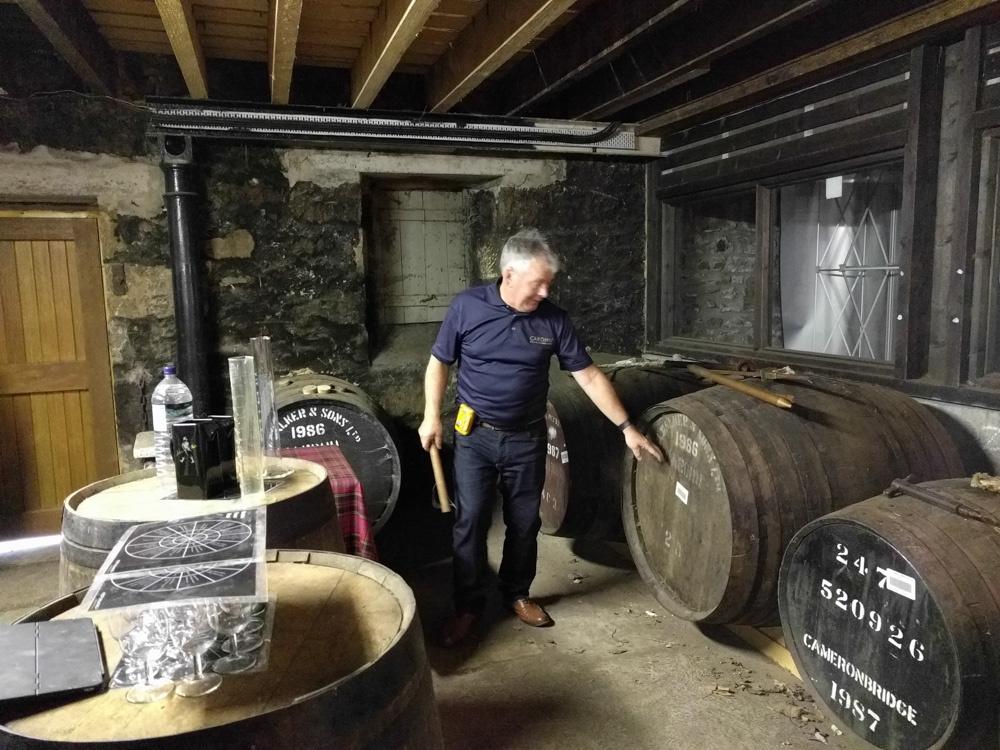 Buzz showing off the old casks