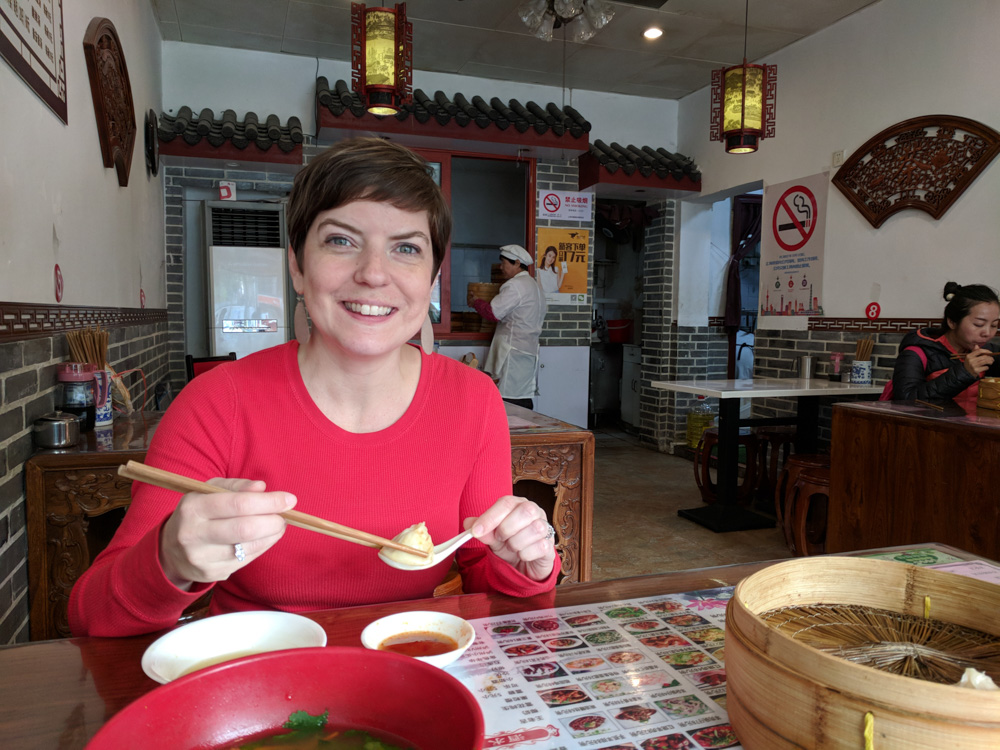 enjoying the soup dumplings