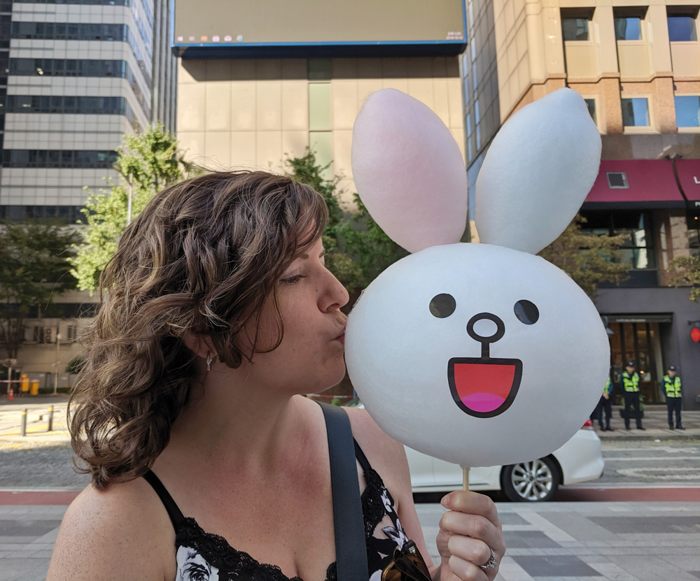 giving cotton candy Cony a kiss
