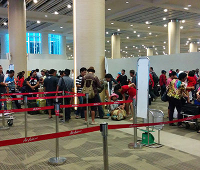 Indonesian airports love lines and little bits of paper